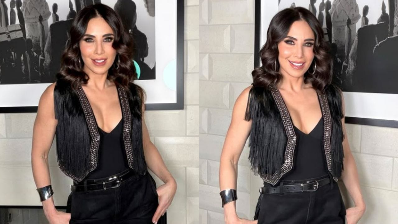 Jorge Posada's wife Laura dons black and white bikini, poses with an effortless smile