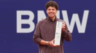 Ben Shelton poses with the men's singles trophy at the 2026 BMW Open in Munich (Source: Getty)
