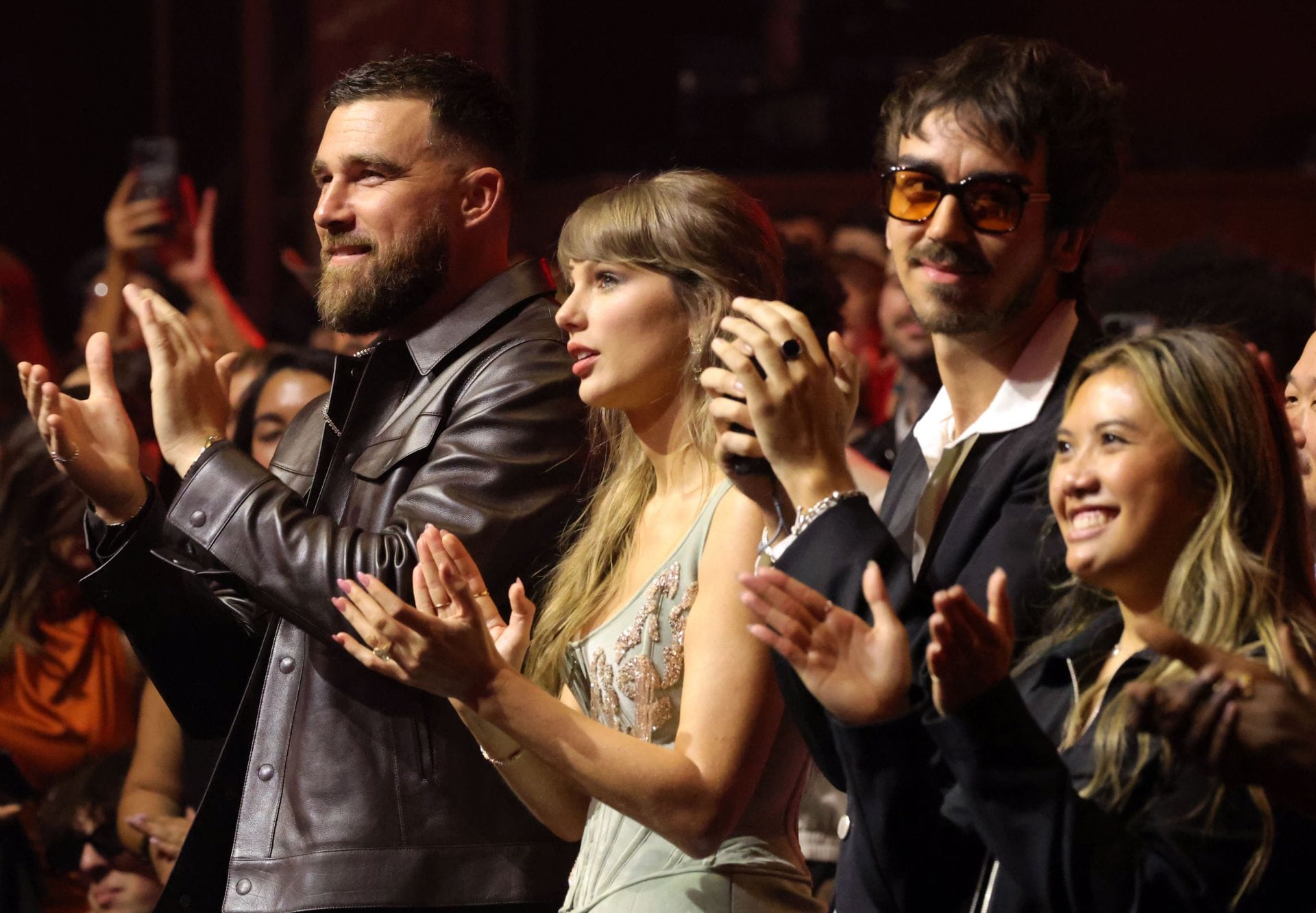 Travis Kelce, Taylor Swift, and Bryce Glenn attend the 2026 iHeartRadio Music Awards at the Dolby Theatre on March 26, 2026, in Los Angeles, California. (Image Source: Getty)