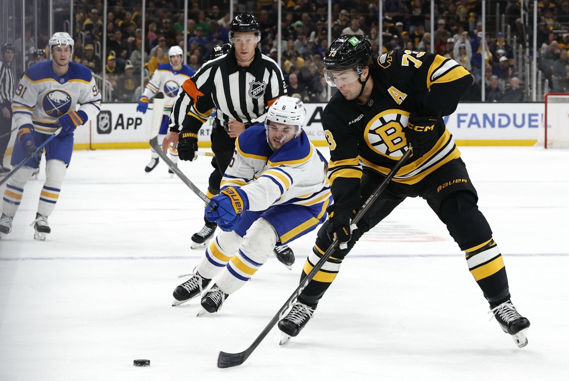 Watch: Bruins' Charlie McAvoy unleashes brutal slash on Zach Benson after vicious slew foot