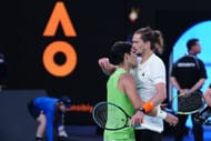 Carlos Alcaraz and Alexander Zverev embrace after their men's singles semifinal match at the 2026 Australian Open (Source: Getty)