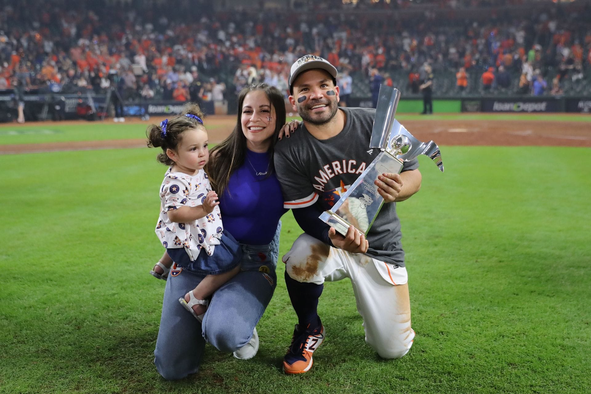 Jose Altuve's wife Neena rocks scarf-detail strapless maxi dress on night out in Houston