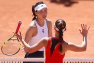 Wang Xinyu (in white) and Tamara Korpatsch (in red) at the 2026 French Open (Source: Getty)