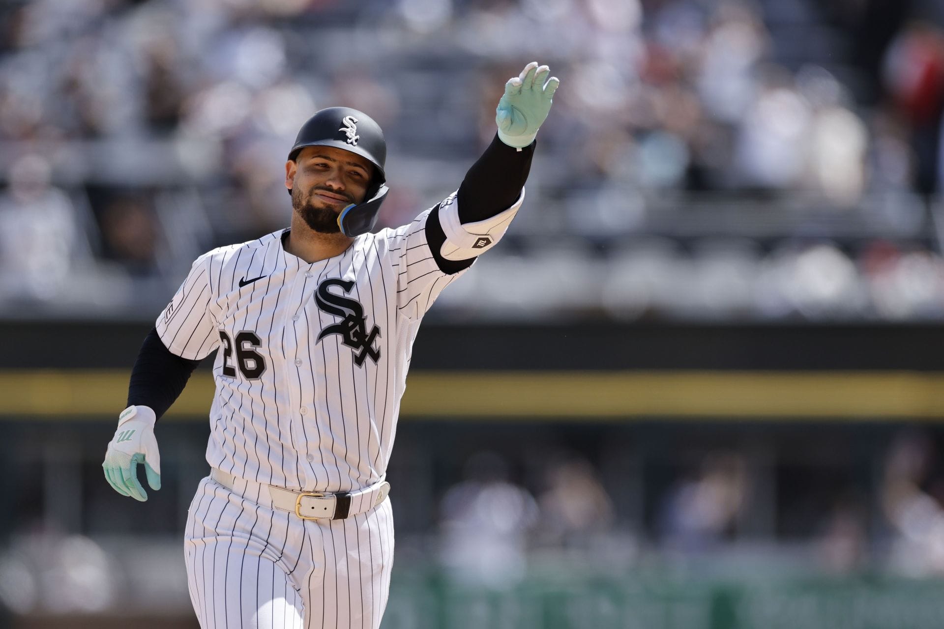 Edgar Quero's girlfriend Maira turns heads in custom White Sox top and baggy camouflage print trousers on the catcher's bobblehead day