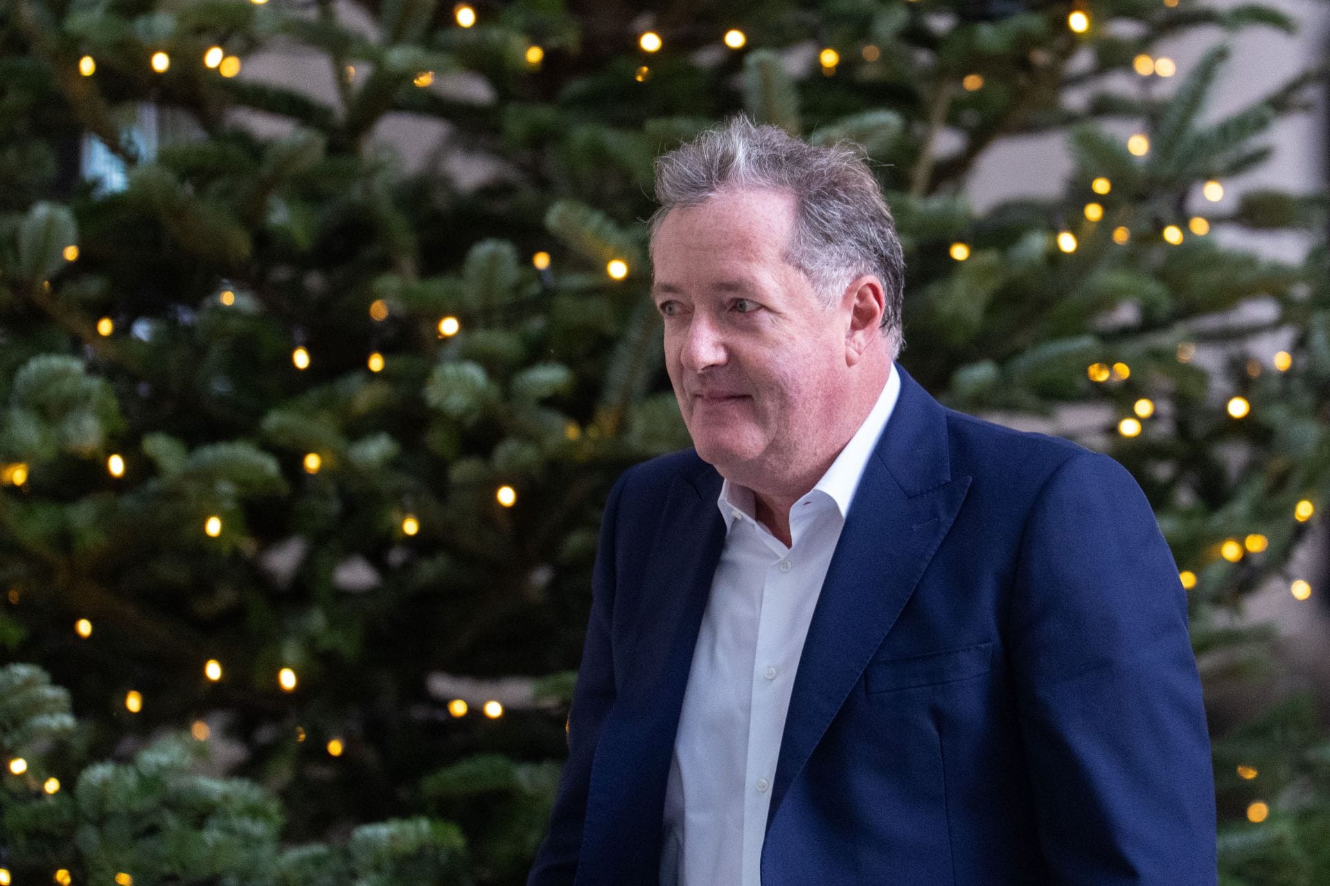 “Then sing live in court”: Piers Morgan mocks Rikki Doolan after the latter threatens to sue him for allegedly sharing an AI-doctored singing video
