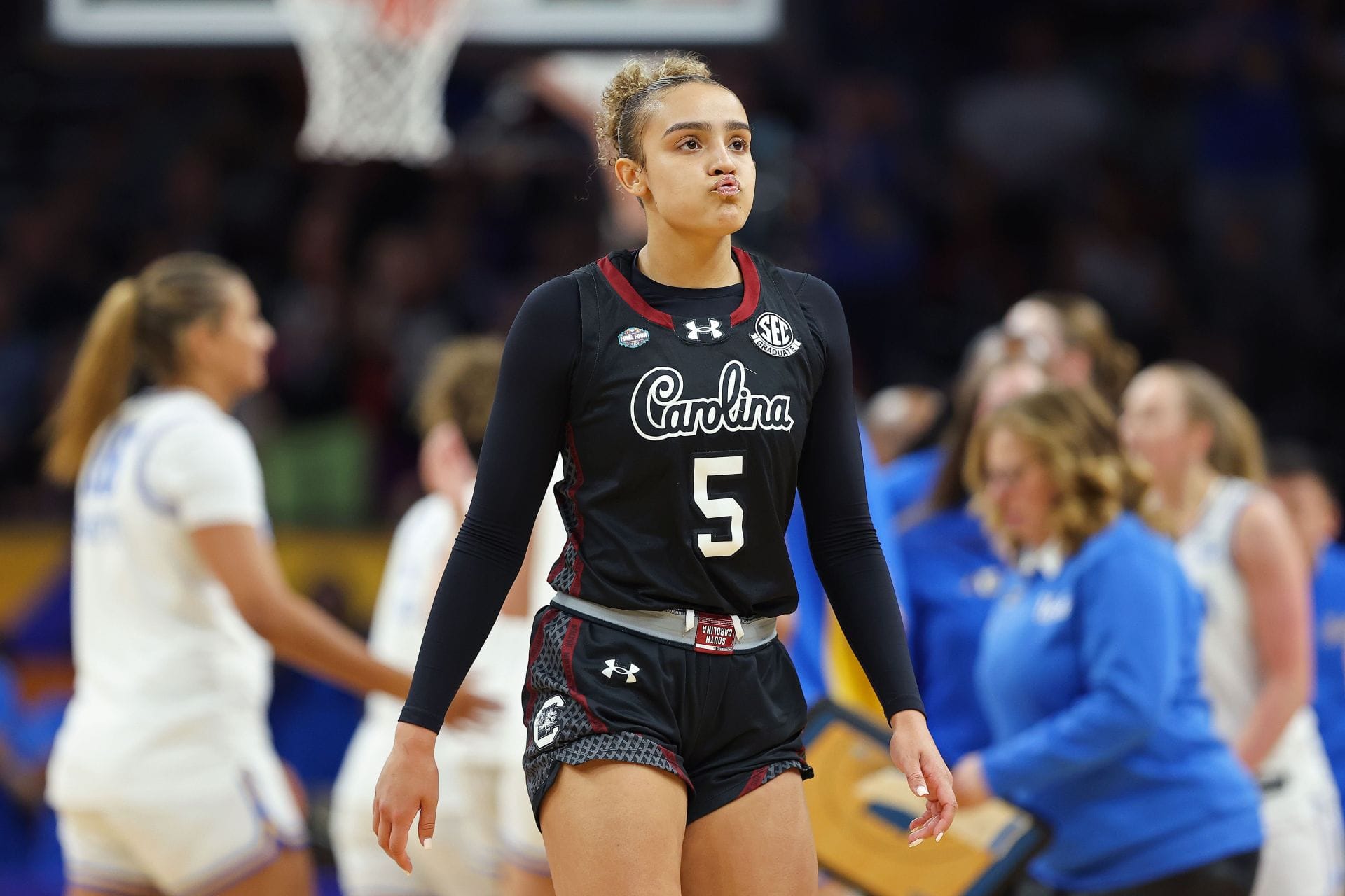 IN PICS: South Carolina star Tessa Johnson serves fierce look in eye-catching red jacket and sleek black boots