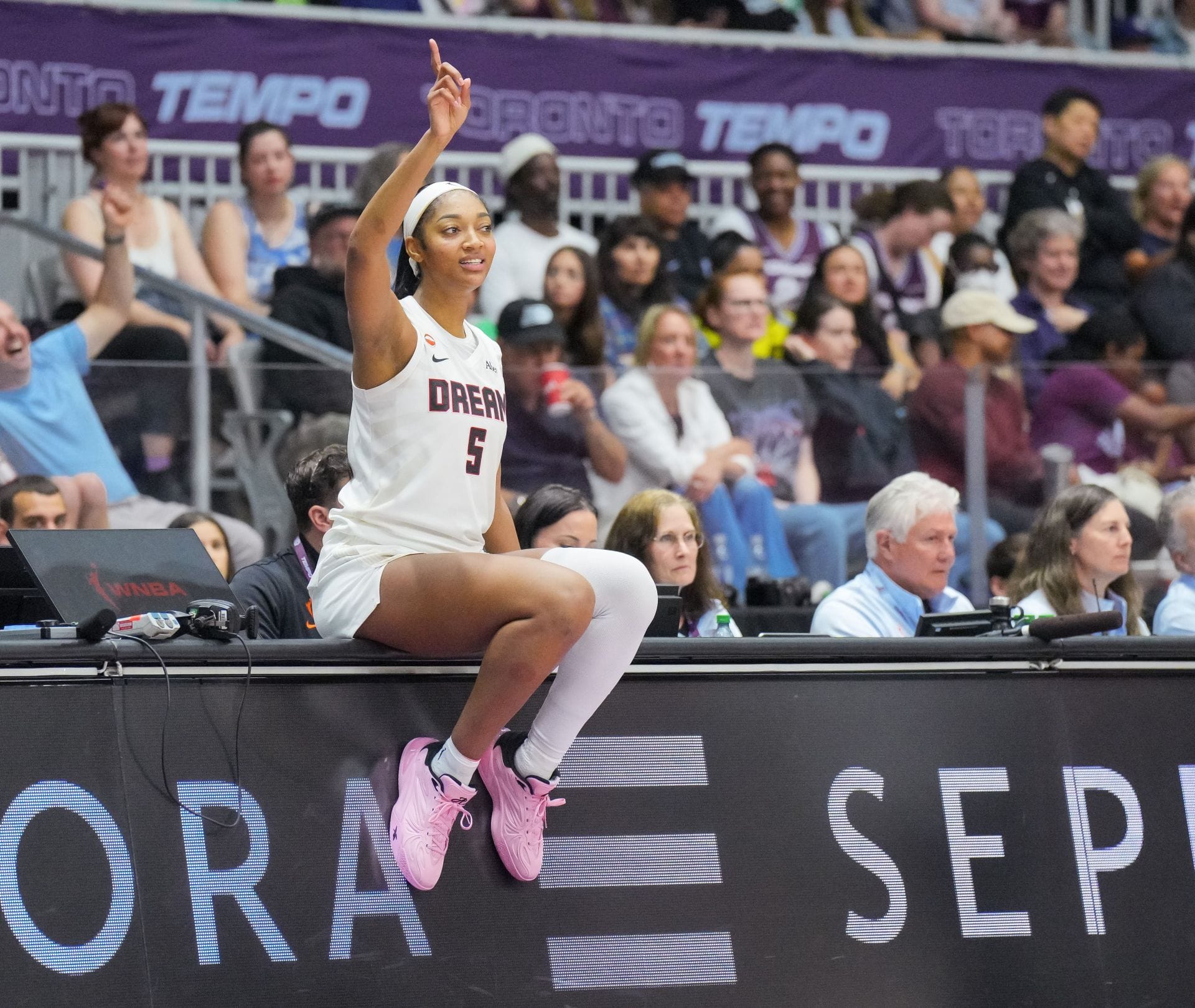 "Damn they made her cry", "Izzy better turn off them notifications " - WNBA Fans Go Wild As Angel Reese Seemingly Holds Back Tears After Brutal Foul