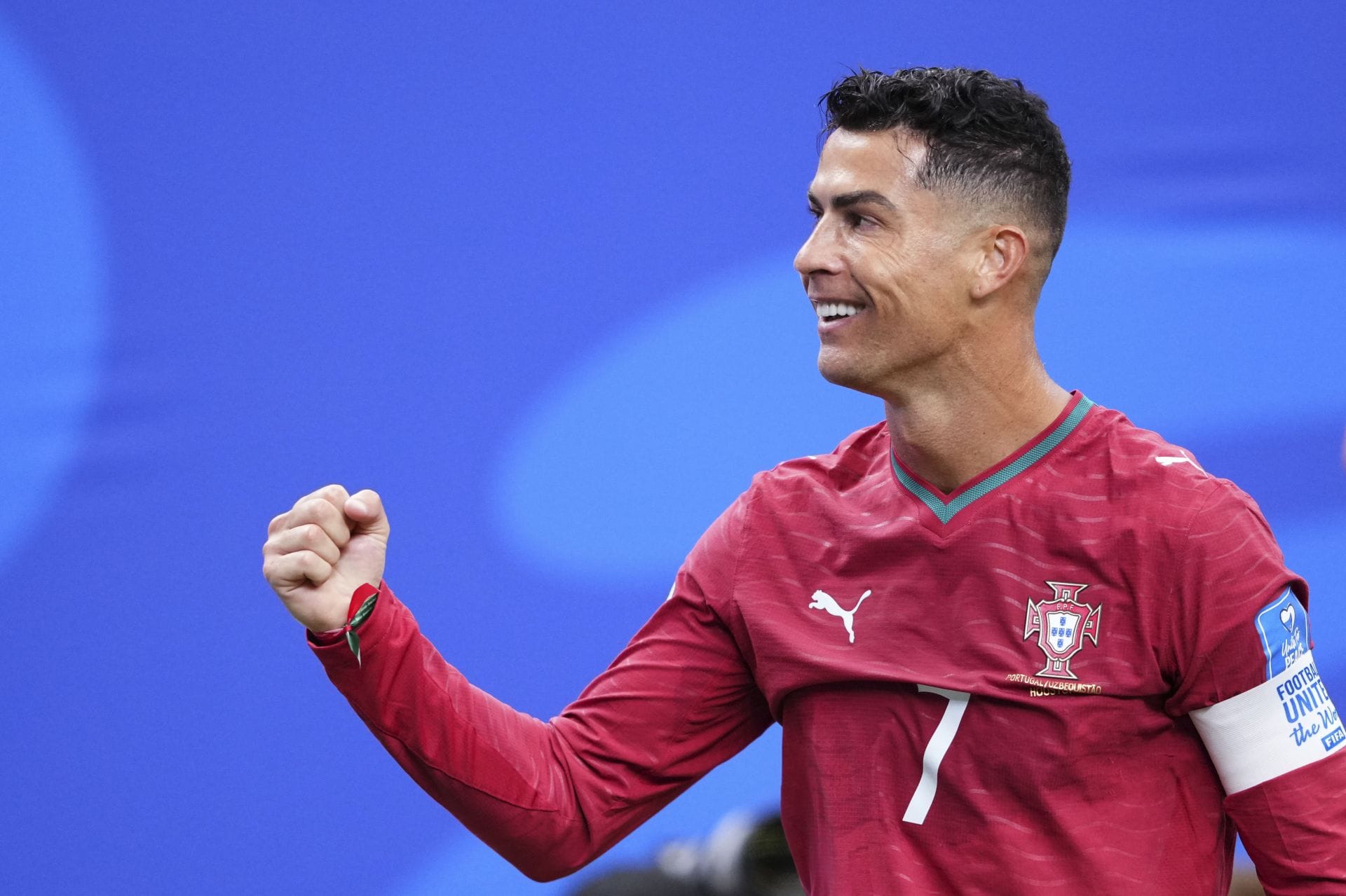What records did Cristiano Ronaldo break after scoring brace for Portugal at the FIFA World Cup against Uzbekistan?