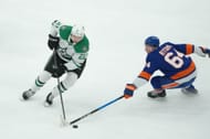 #21 Jason Robertson battling for puck - Source: Getty
