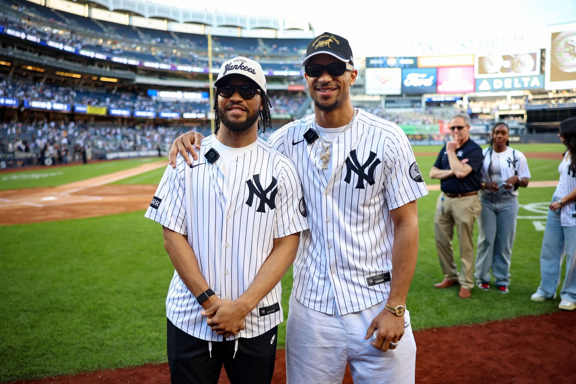 Knicks champs Jalen Brunson & Josh Hart steal the show at Yankees game with partners as epic ceremonial first pitch breaks the internet