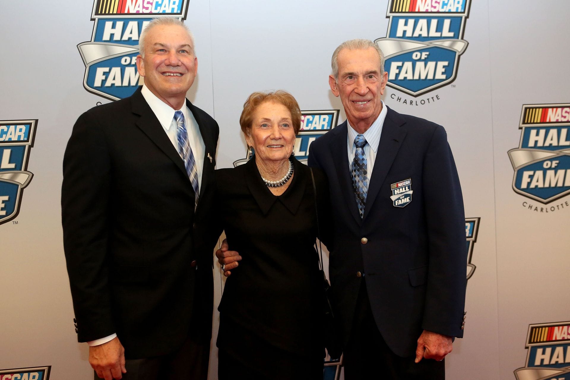 Ned Jarrett, Martha Jarrett with son Dale Jarrett at NASCAR Hall of Fame on January 29, 2014. - Source: Getty