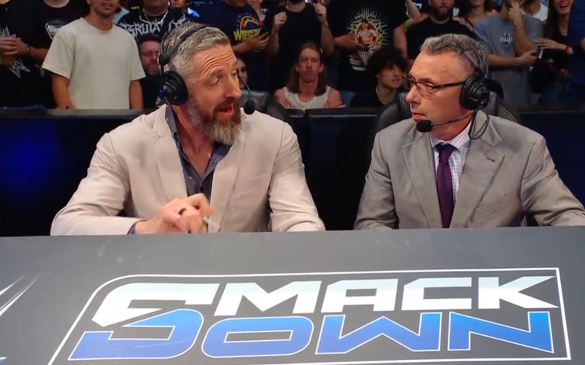 Michael Cole left stunned after 2-time World Champion destroys the announce desk in the opening segment of SmackDown