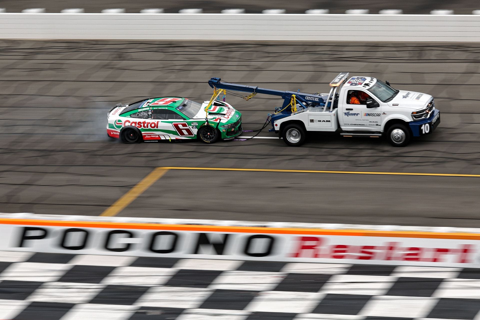 Bubba Wallace’s spotter takes a sly dig at Brad Keselowski’s “a** plowed” comment after Pocono wreck
