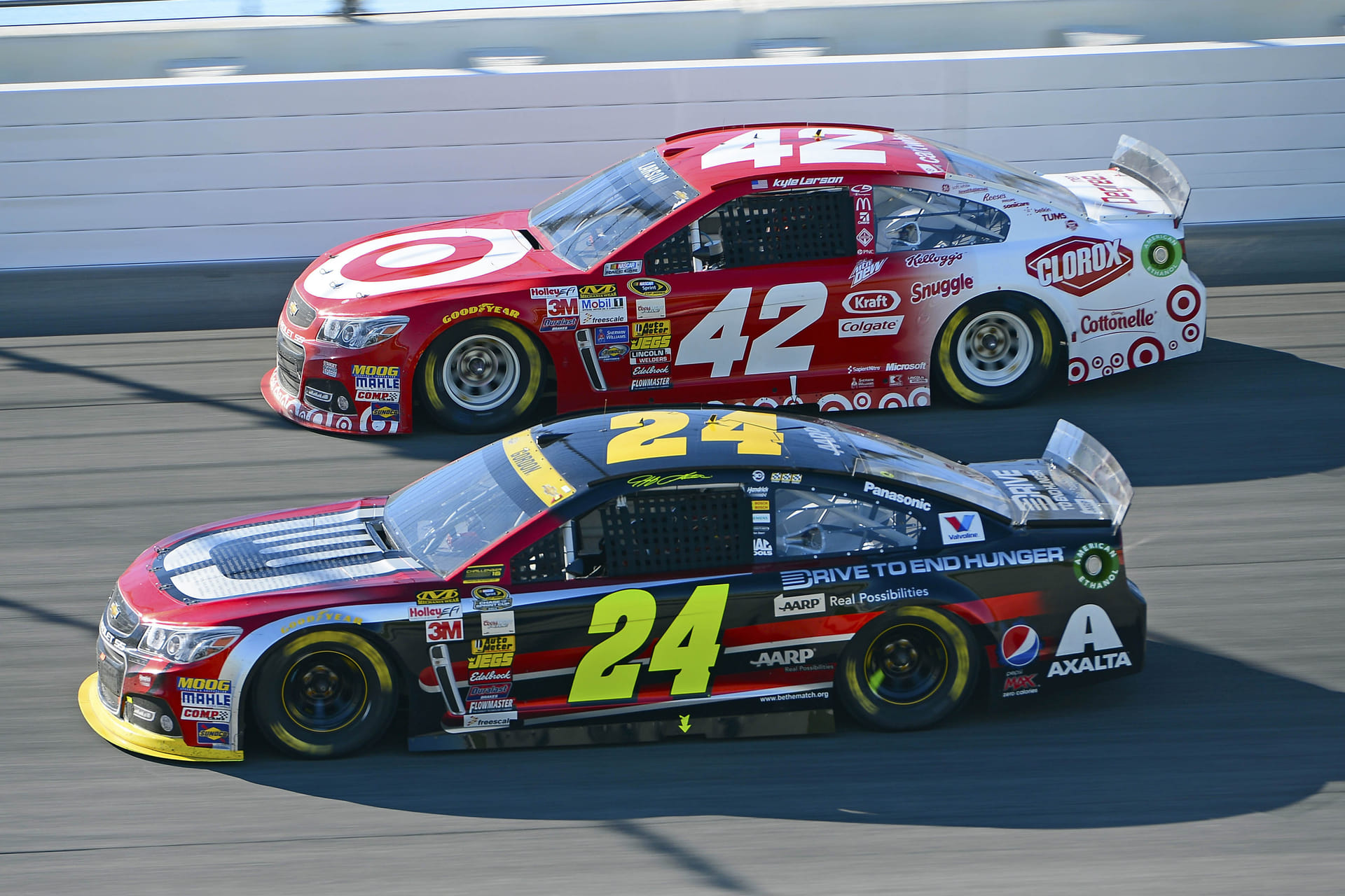 Jeff Gordon (24) and Kyle Larson (42) during the 2014 NASCAR race at Chicagoland. Source: Imagn