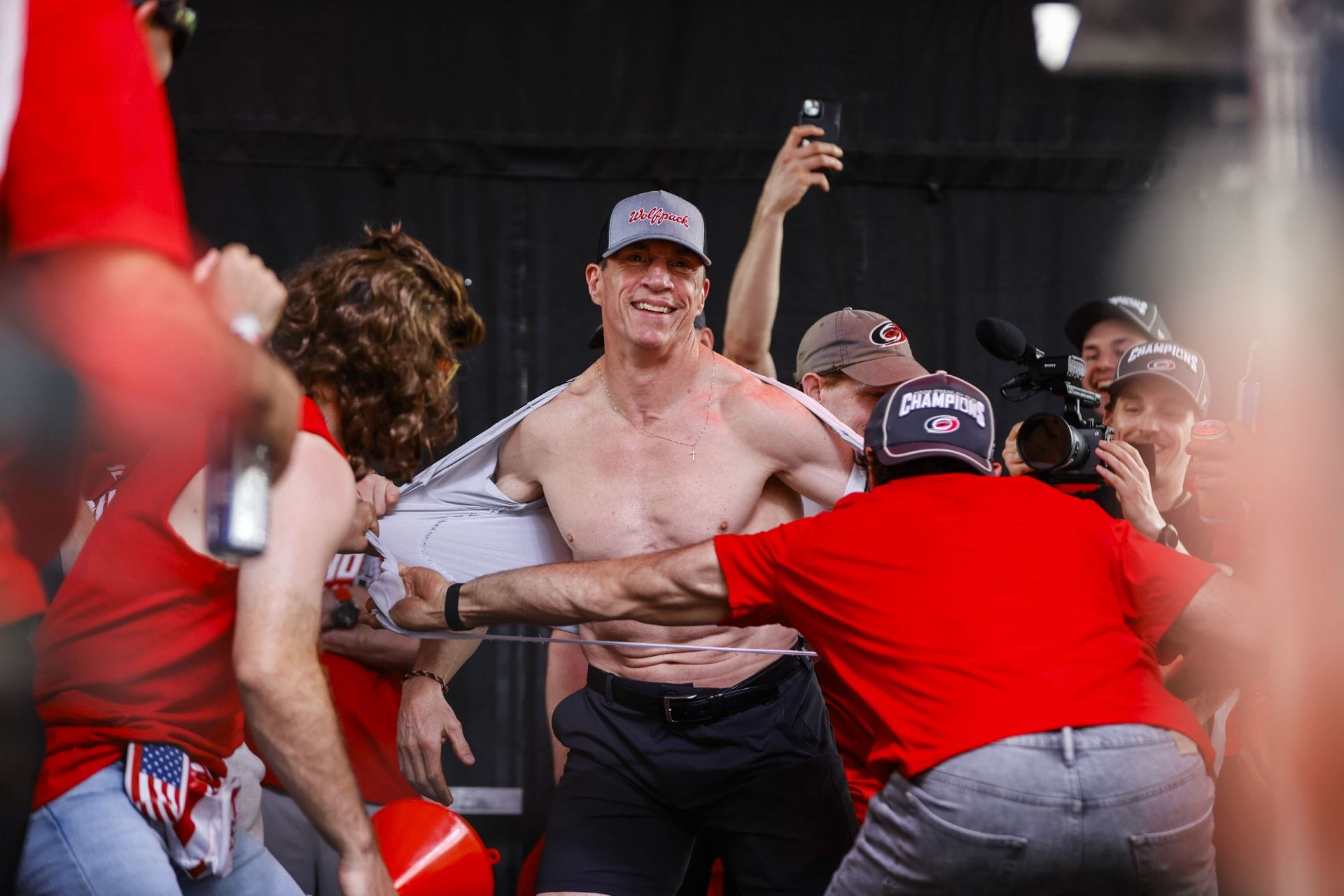 WATCH: 'Rod the Bod' goes tarps off as players rip Brind'Amour's shirt in Carolina Hurricanes Stanley Cup victory parade