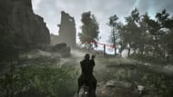 Go right of the lighthouse to find the trail leading down towards the beach (Image via Alkimia Interactive)