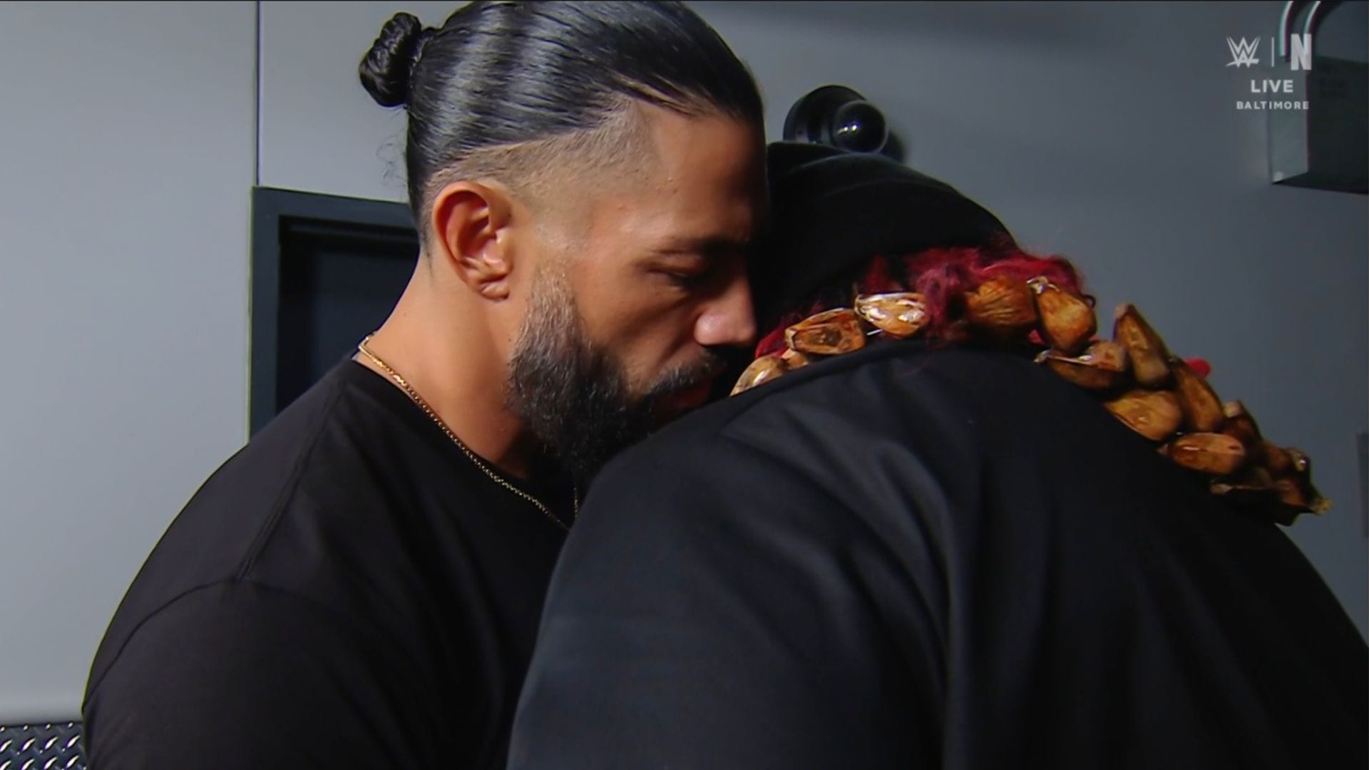 What did Roman Reigns whisper in Jacob Fatu’s ear on WWE RAW?
