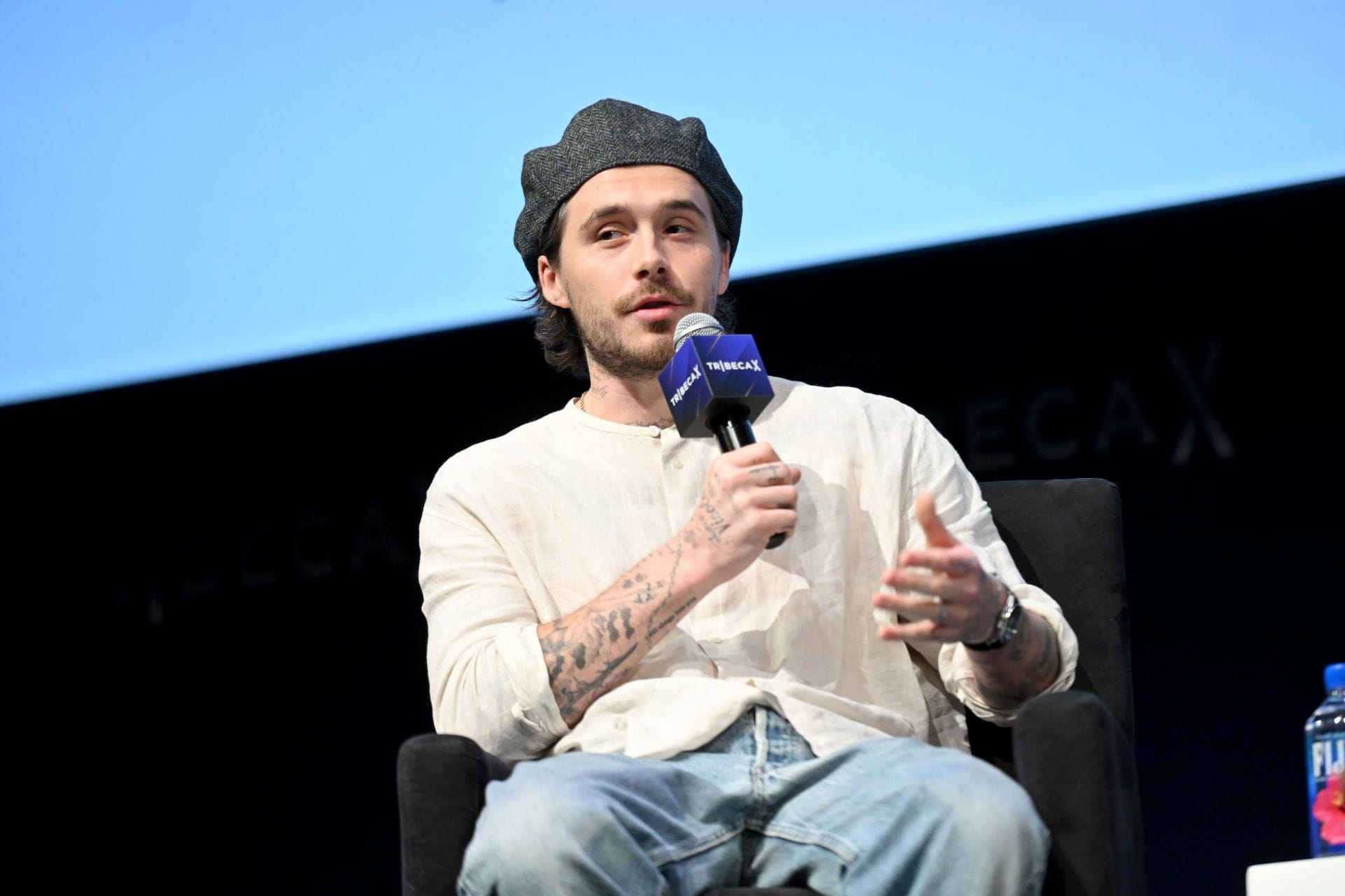 Piers Morgan calls Brooklyn Beckham "Prince Harry of spoiled brat entitled sons" as he features in an ad seemingly mocking his family feud