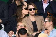Minke and Cara Delevingne kiss as they attend day eight of the Wimbledon Tennis Championships at All England Lawn Tennis and Croquet Club on July 10, 2023 in London, England. (Source: Getty)
