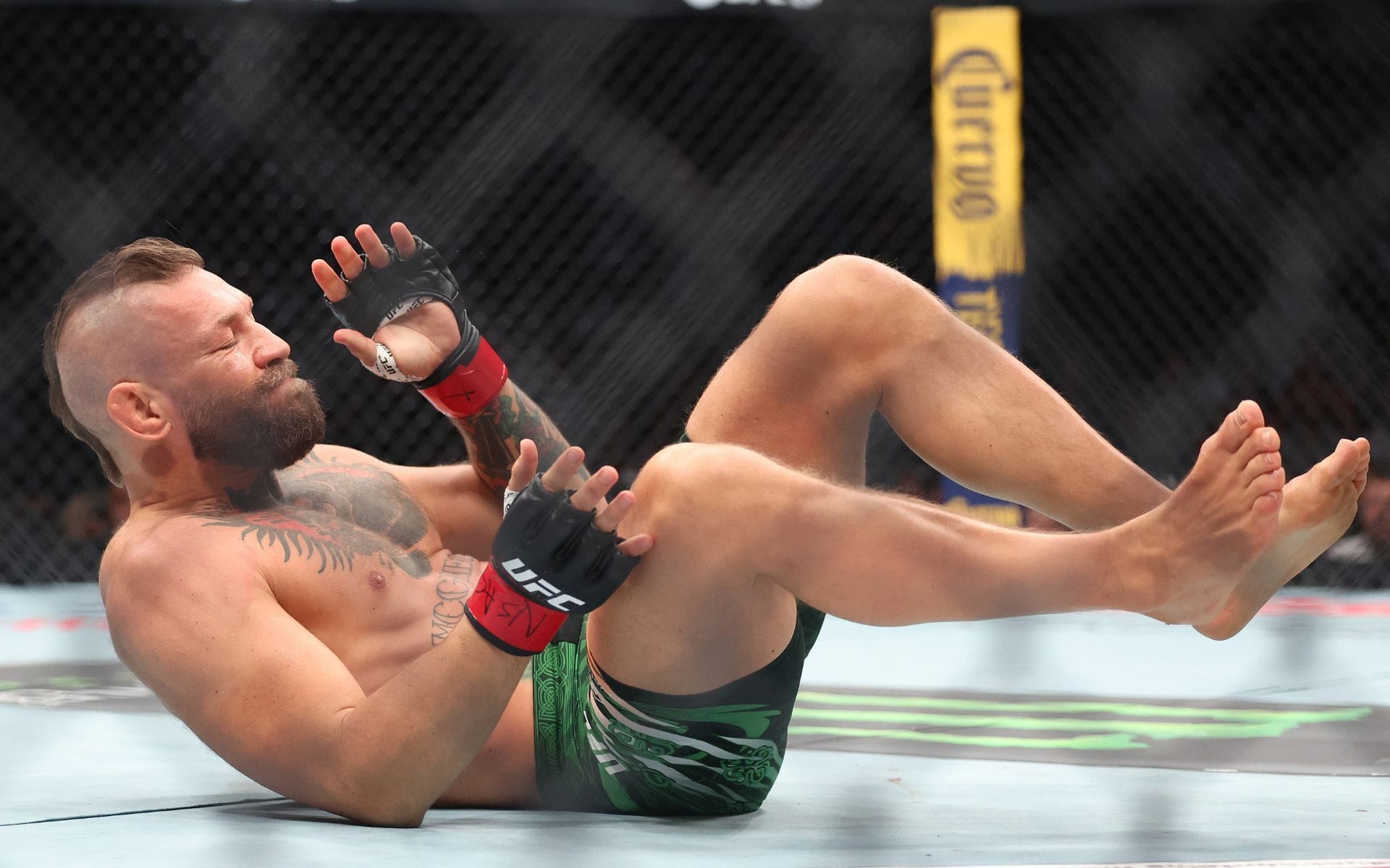 The Drake Curse hits again as Conor McGregor seemingly blows out his knee during first kick at UFC 329