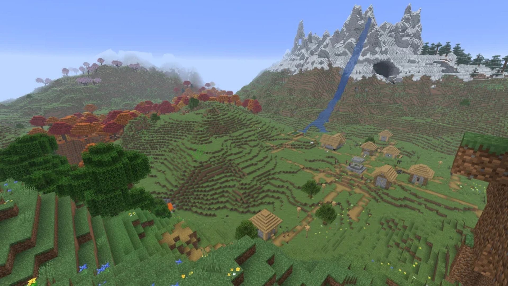 The village has a beautiful mountain right behind it (Image via Mojang Studios || Reddit/@SoloExperiencer)