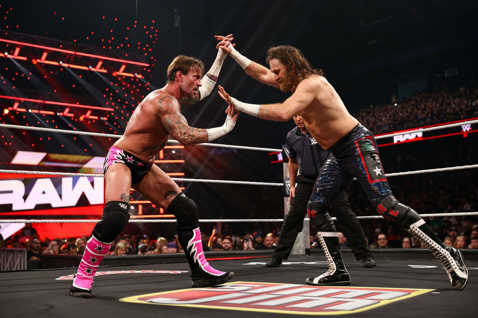 CM Punk breaks character to praise Sami Zayn after WWE title win