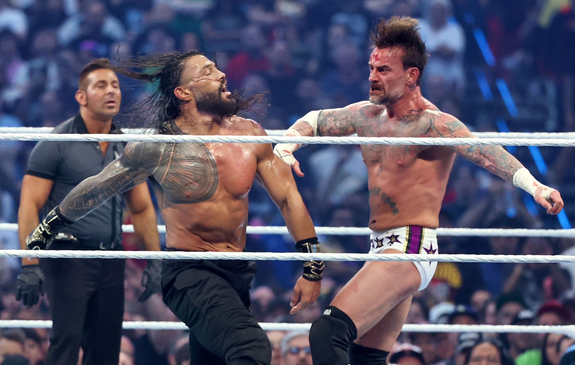 3 Clear WWE signs Roman Reigns vs. CM Punk II is in the works