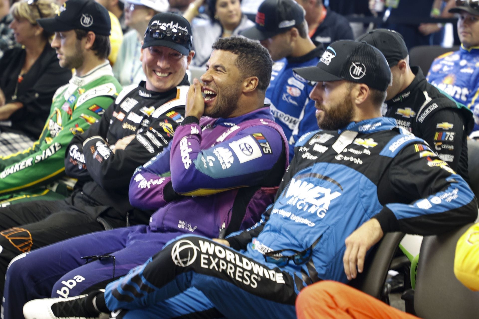 Bubba Wallace explains why he added Kyle Busch hat as the “centerpiece” to his helmet wall