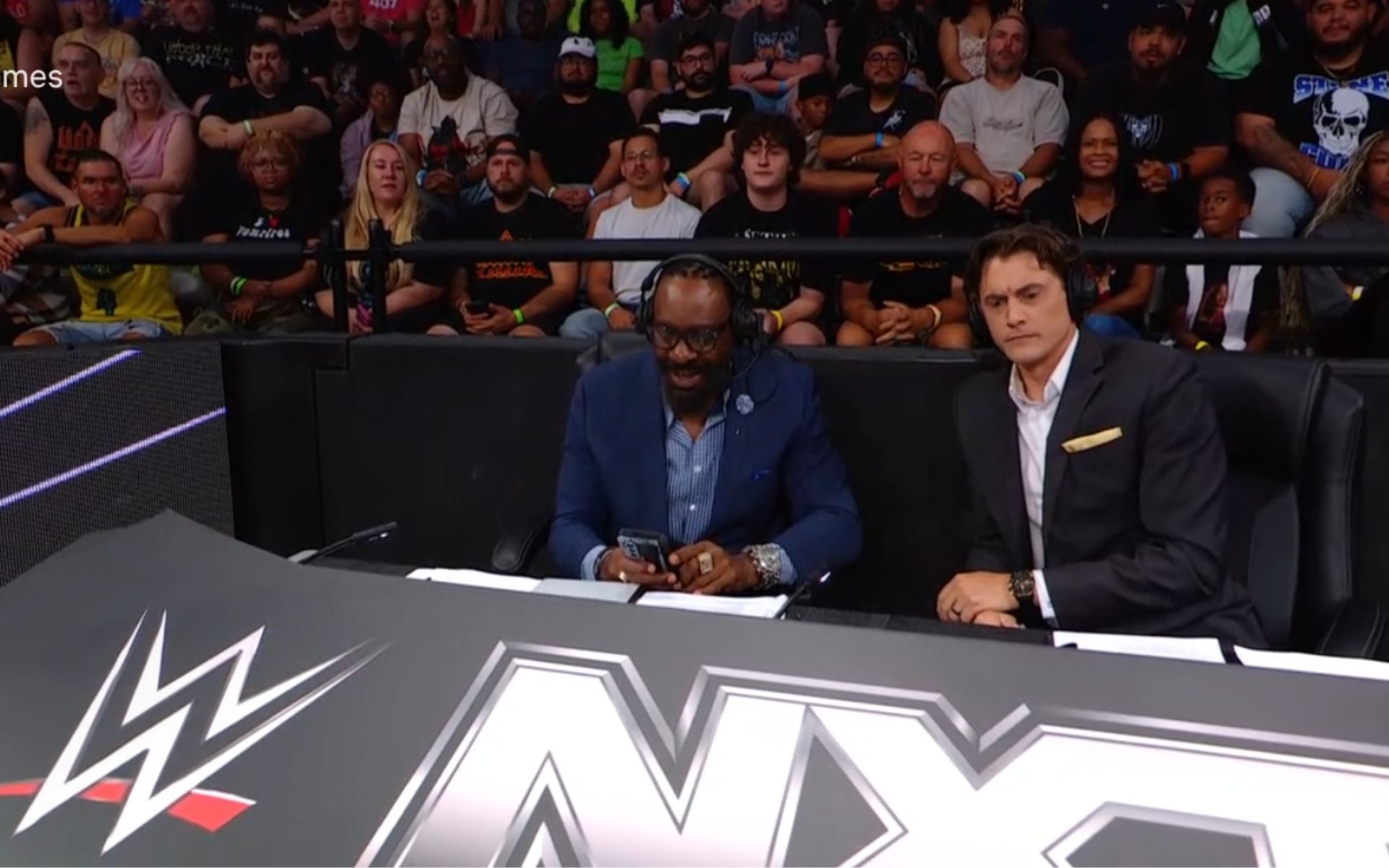 RAW superstar's husband suddenly calls Booker T during WWE show; announces he is "60%" medically clear