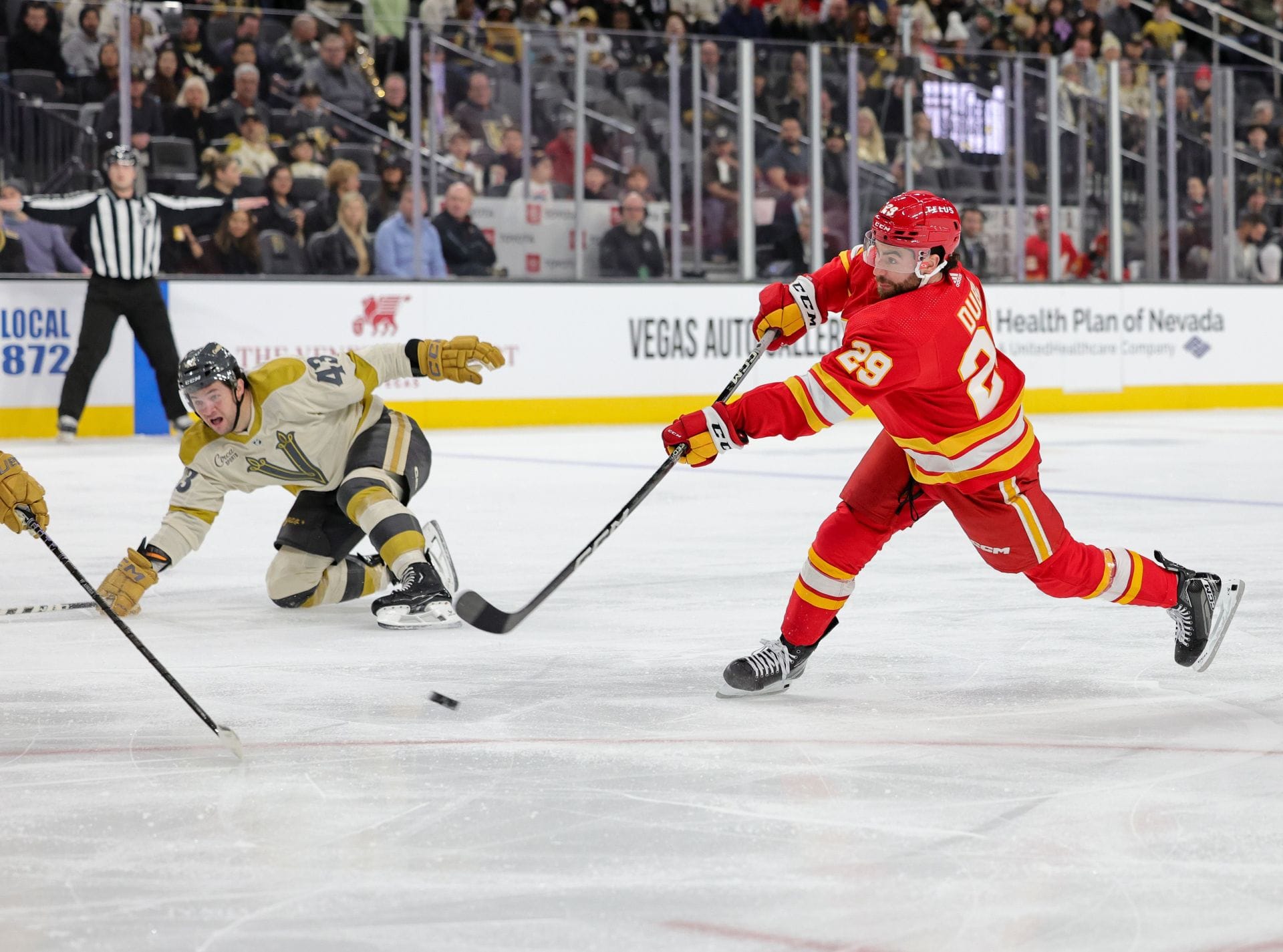 #29 Dillon Dube shoots the puck - Source: Getty