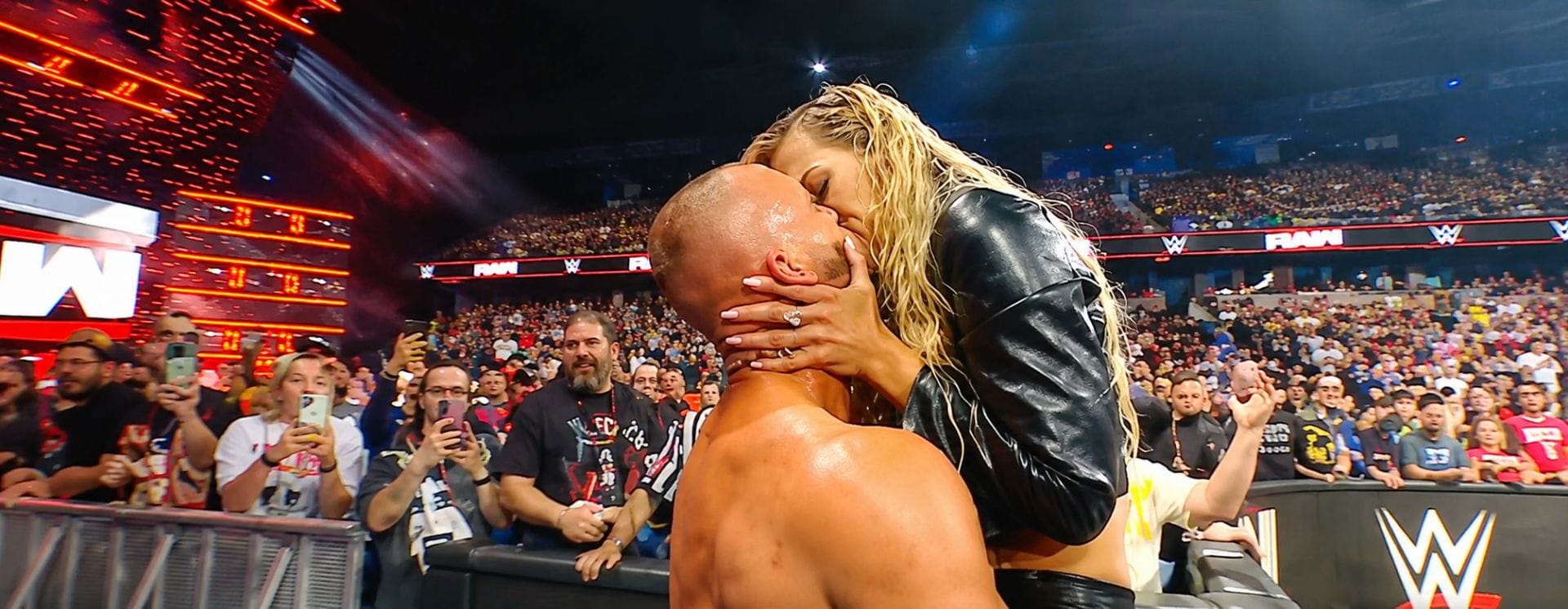 6 Times WWE Superstars With Real-Life Partners Kissed Another Star on TV