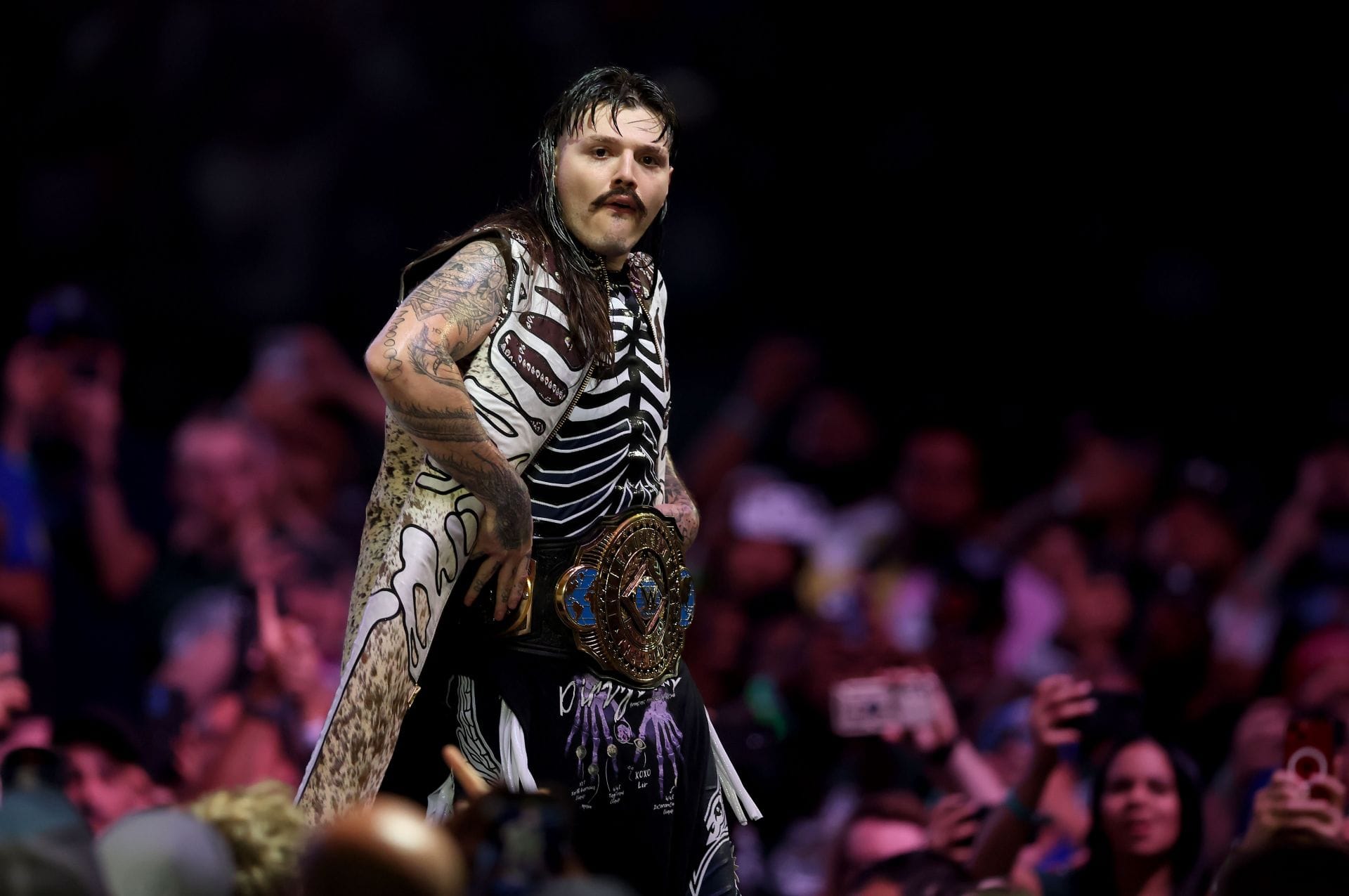 Dominik Mysterio explains why he wears a vest in WWE