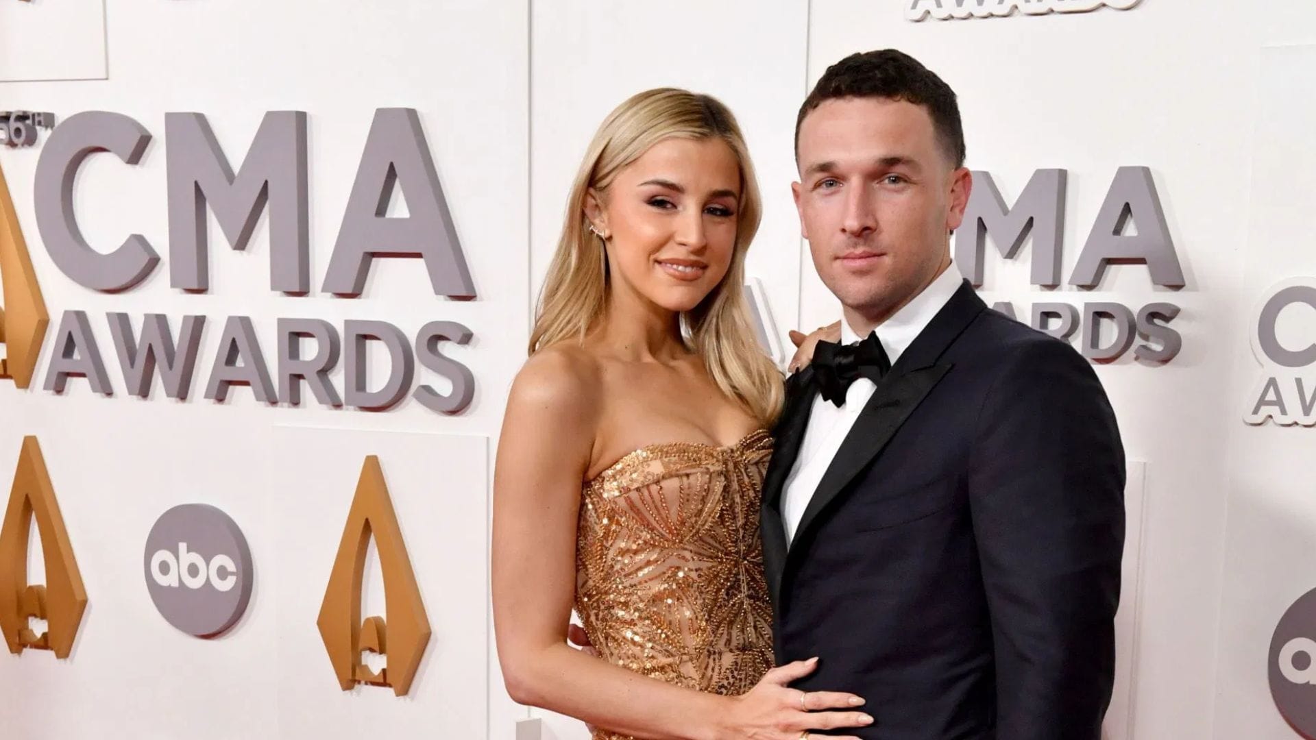 "So perfect" - Alex Bregman's wife Reagan gushes over Austin Gomber's spouse Rachel's chic look in blue and orange apron-style mini dress