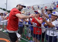 A young boy, far right, is thrilled as Bills Josh Allen makes his way towards him after Bills Training Camp at St. John Fisher - Source: Imagn