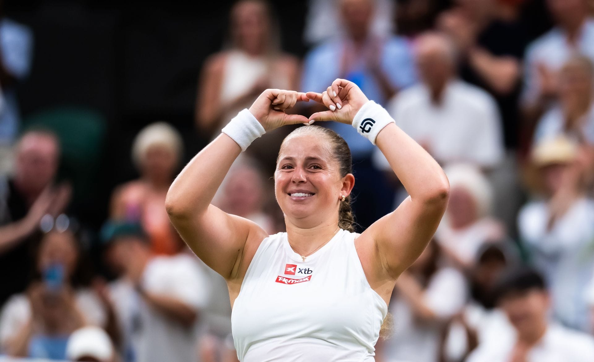 PICTURES: Jelena Ostapenko poses in pink swimsuit as she enjoys relaxing dip in pool ahead of US Open