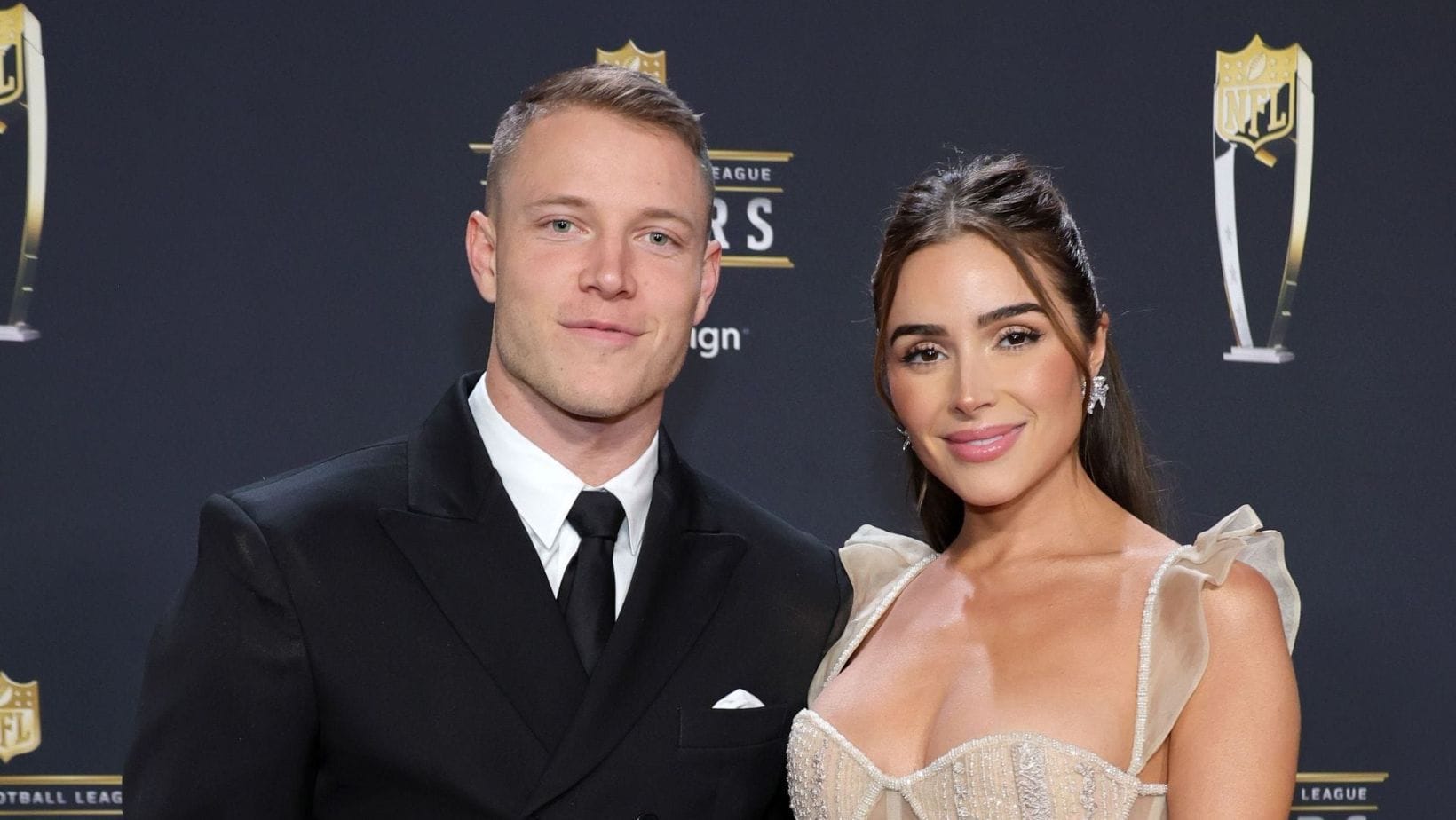 SPOTTED: Christian McCaffrey’s pregnant wife Olivia Culpo bares baby bump in crop top x denim during LA outing