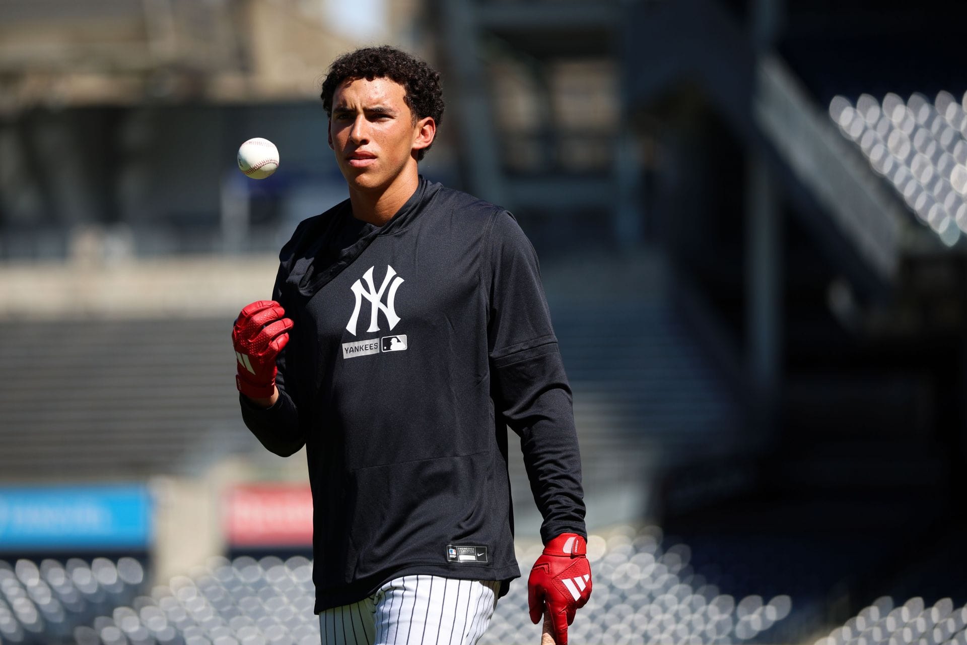 George Lombard Jr. in action during a New York Yankees workout - Source: Getty