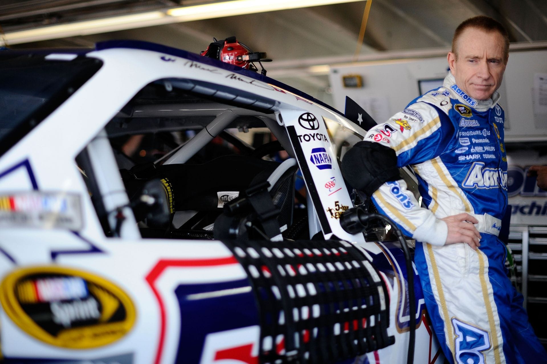 Mark Martin in front of the No. 55 Toyota at Charlotte Motor Speedway. Source: Getty
