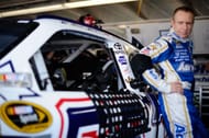 Mark Martin in front of the No. 55 Toyota at Charlotte Motor Speedway. Source: Getty