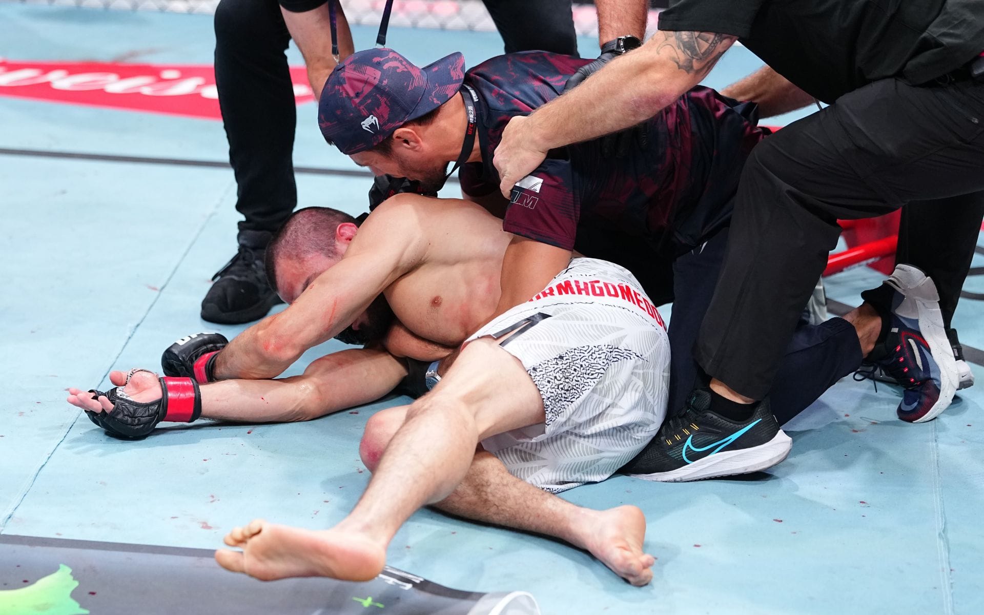 "Banned with immediate effect" - MMA fans react to Usman Nurmagomedov rushing into the octagon following brother Umar Nurmagomedov's KO loss
