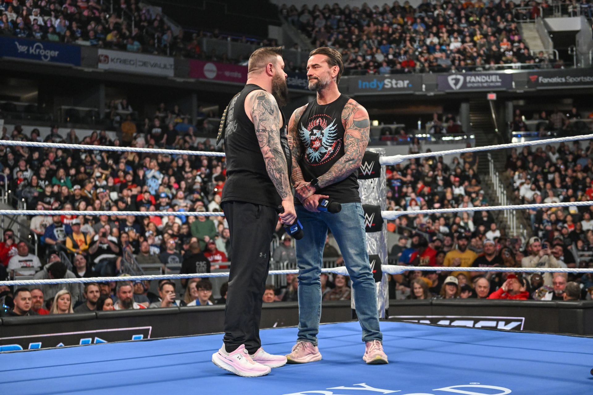 Photo: sportskeeda.com CM Punk and Kevin Owens Ignite Verbal War on SmackDown