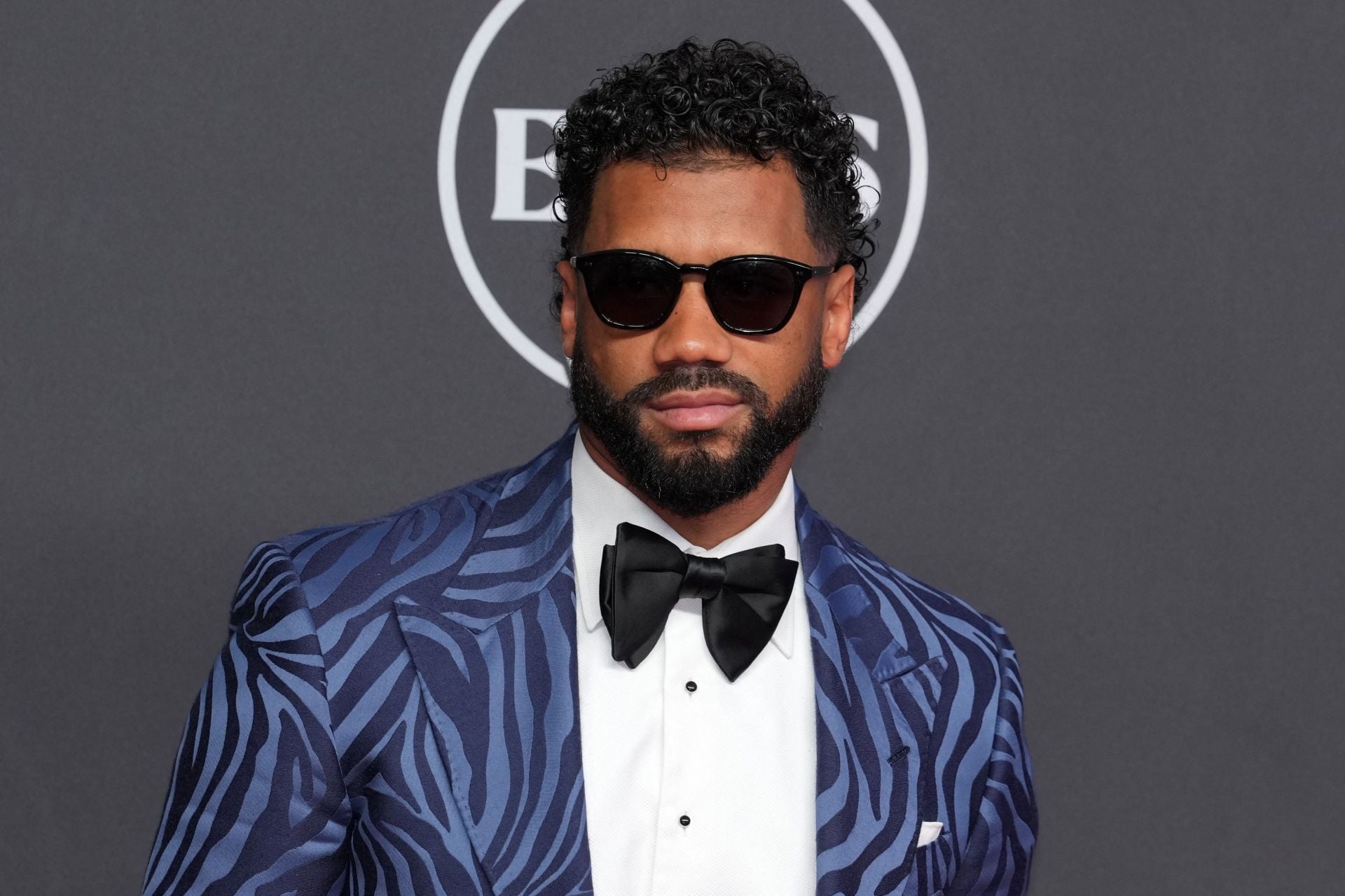 "Russ bout to have a more successful career after football": NFL fans react to Russell Wilson posing with Michael Jordan at NASCAR team event