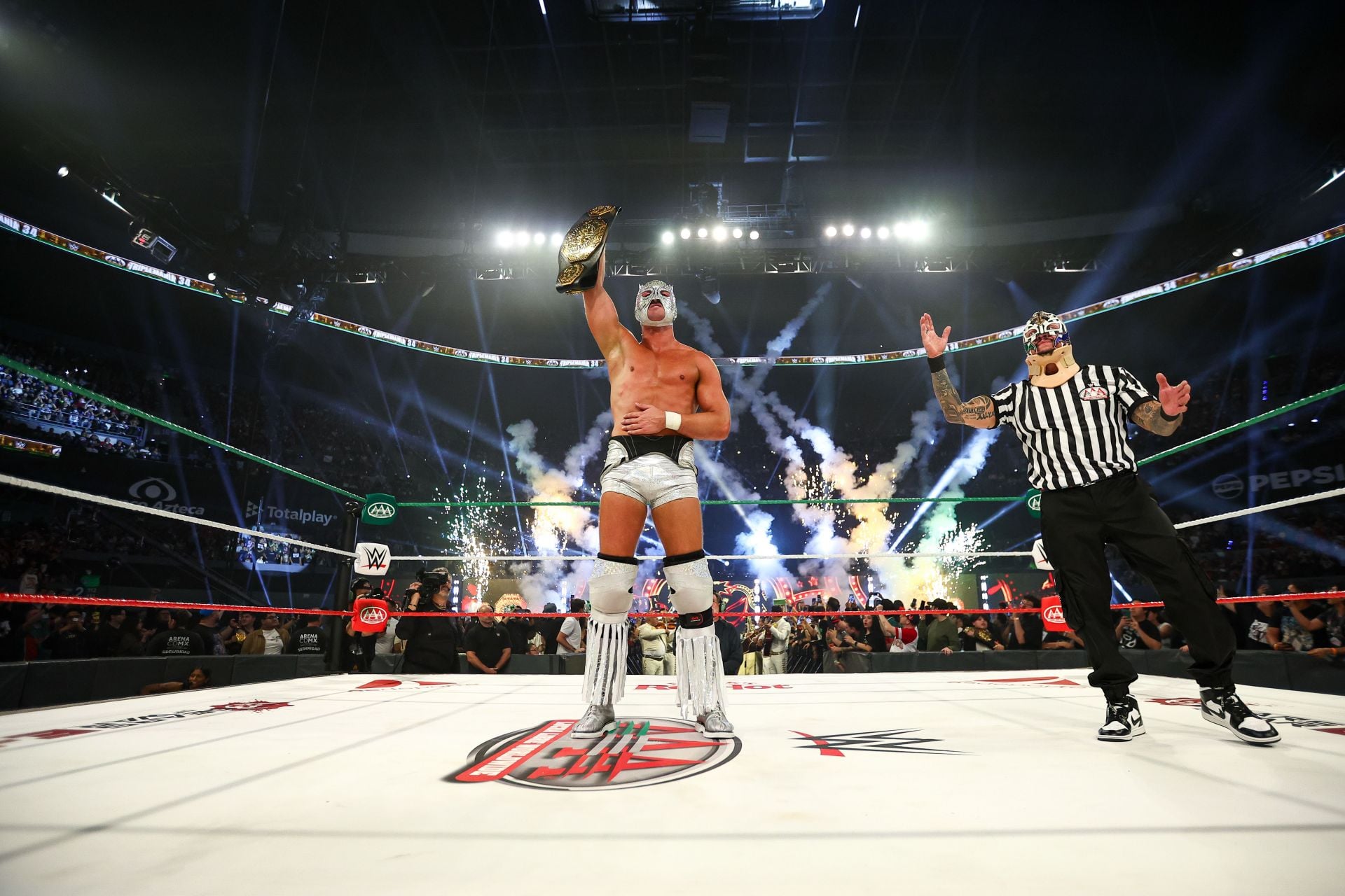 El Grande Americano Kisses 34-Year-Old Female Personality After Winning The AAA Mega Championship