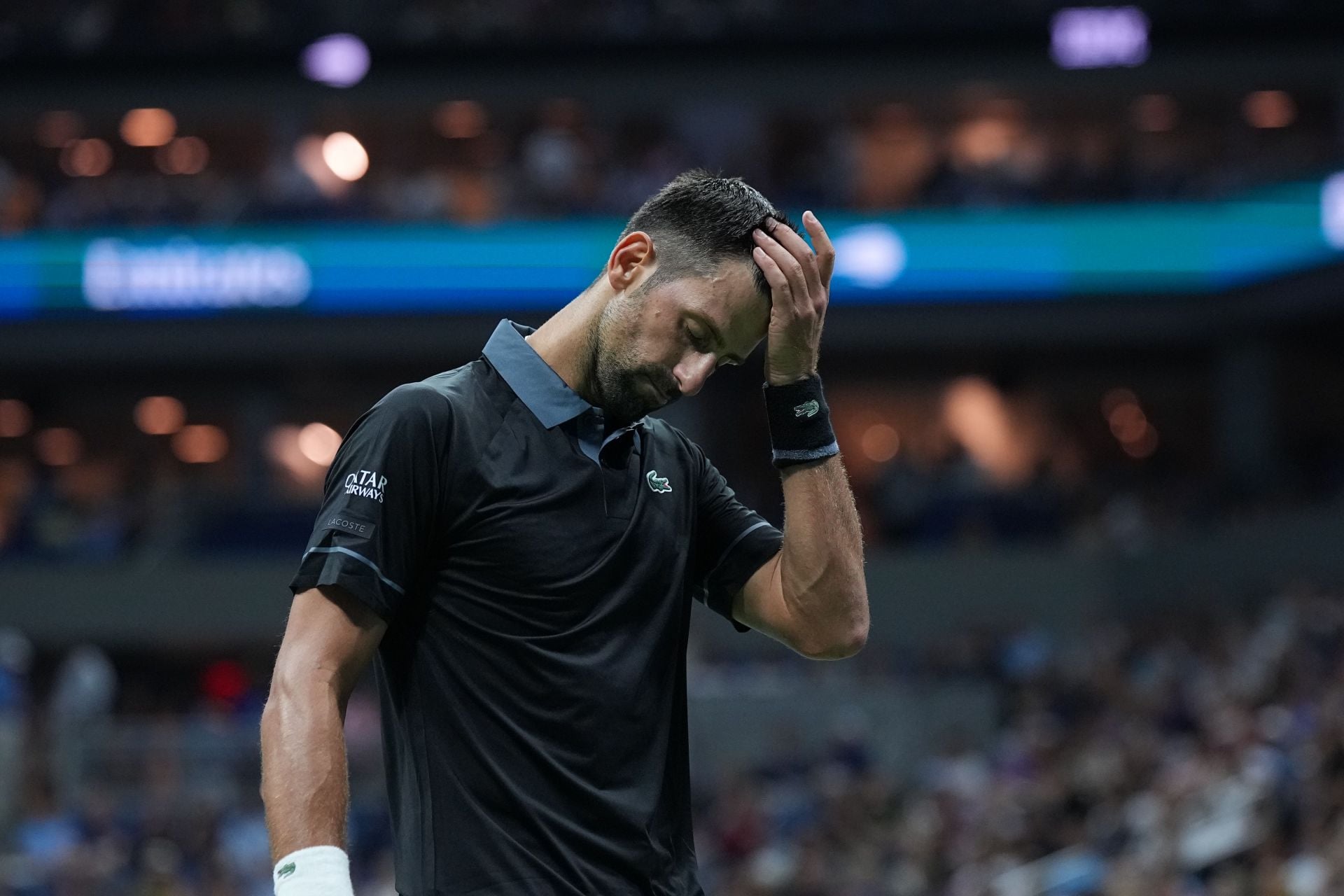 WATCH: Novak Djokovic hit on the face in freak accident after fan throws cap at Serb in China Open warm-up