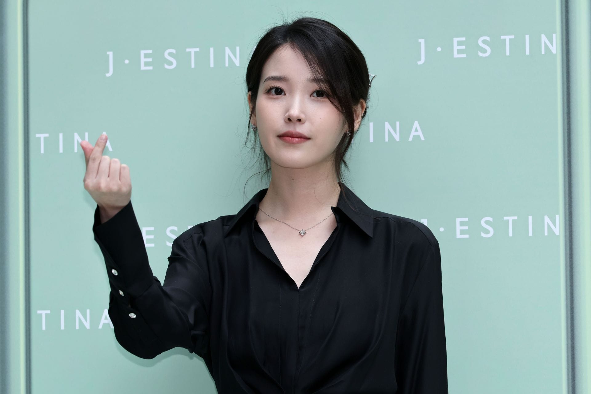 “A scheduled global mood swing”: Netizens react as IU announces new single after a year-long music hiatus 