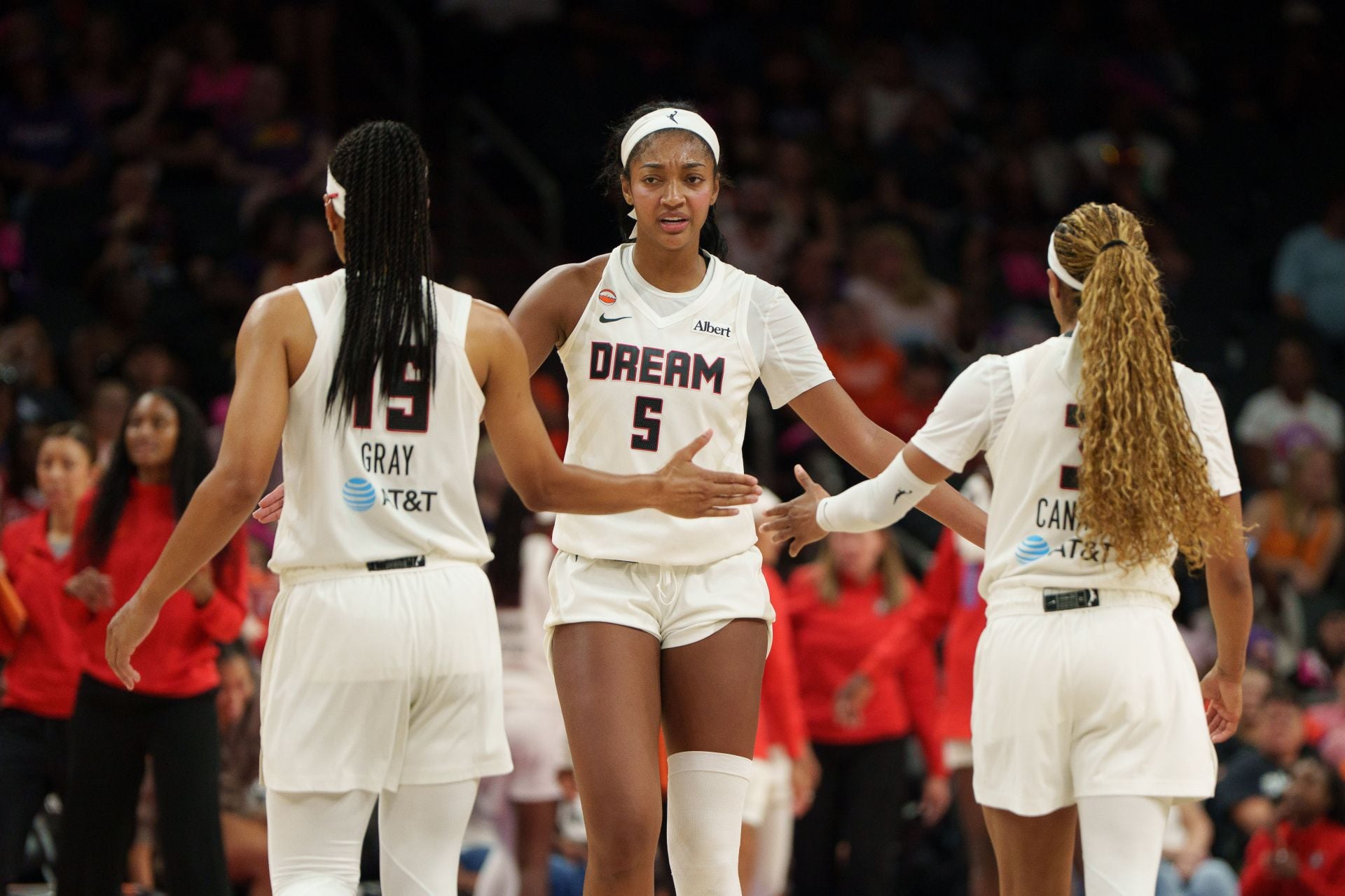 Angel Reese celebrates with Allisha Gray and Jordin Canada - Source: Imagn