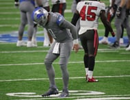 Former Detroit Lions quarterback Matthew Stafford walking away from the field after injuring his ankle against the Buccaneers in 2020 - Source: Imagn