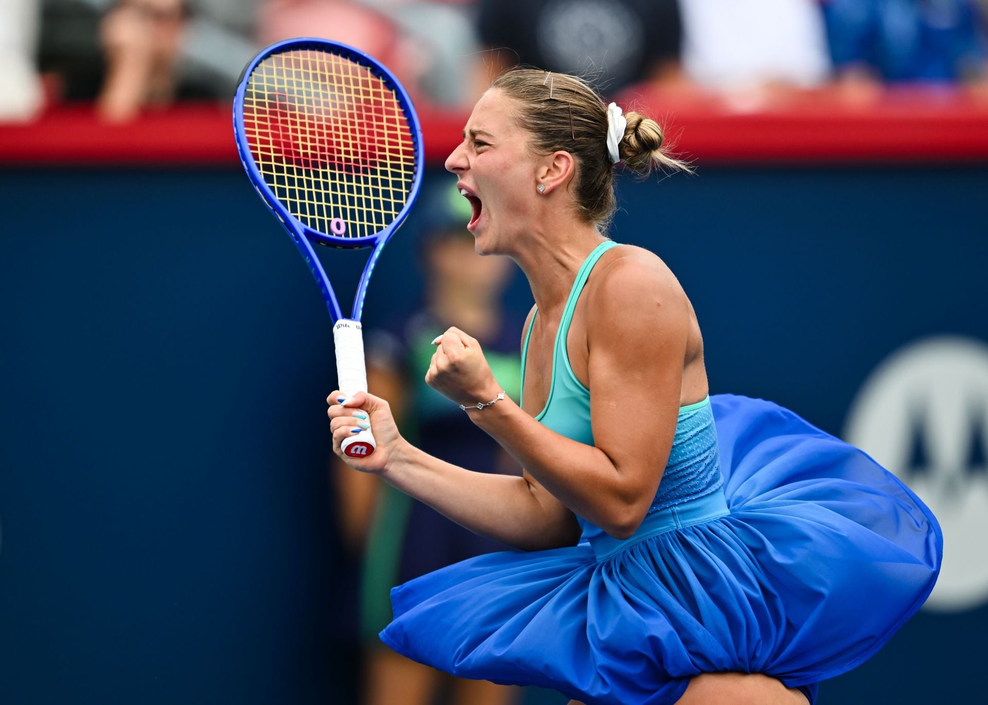 PICTURES: Marta Kostyuk poses in orange swimsuit as she enjoys picture-perfect island vacation