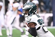 Former Philadelphia Eagles wide receiver John Ross warms up before a game against the New England Patriots - Source: Imagn