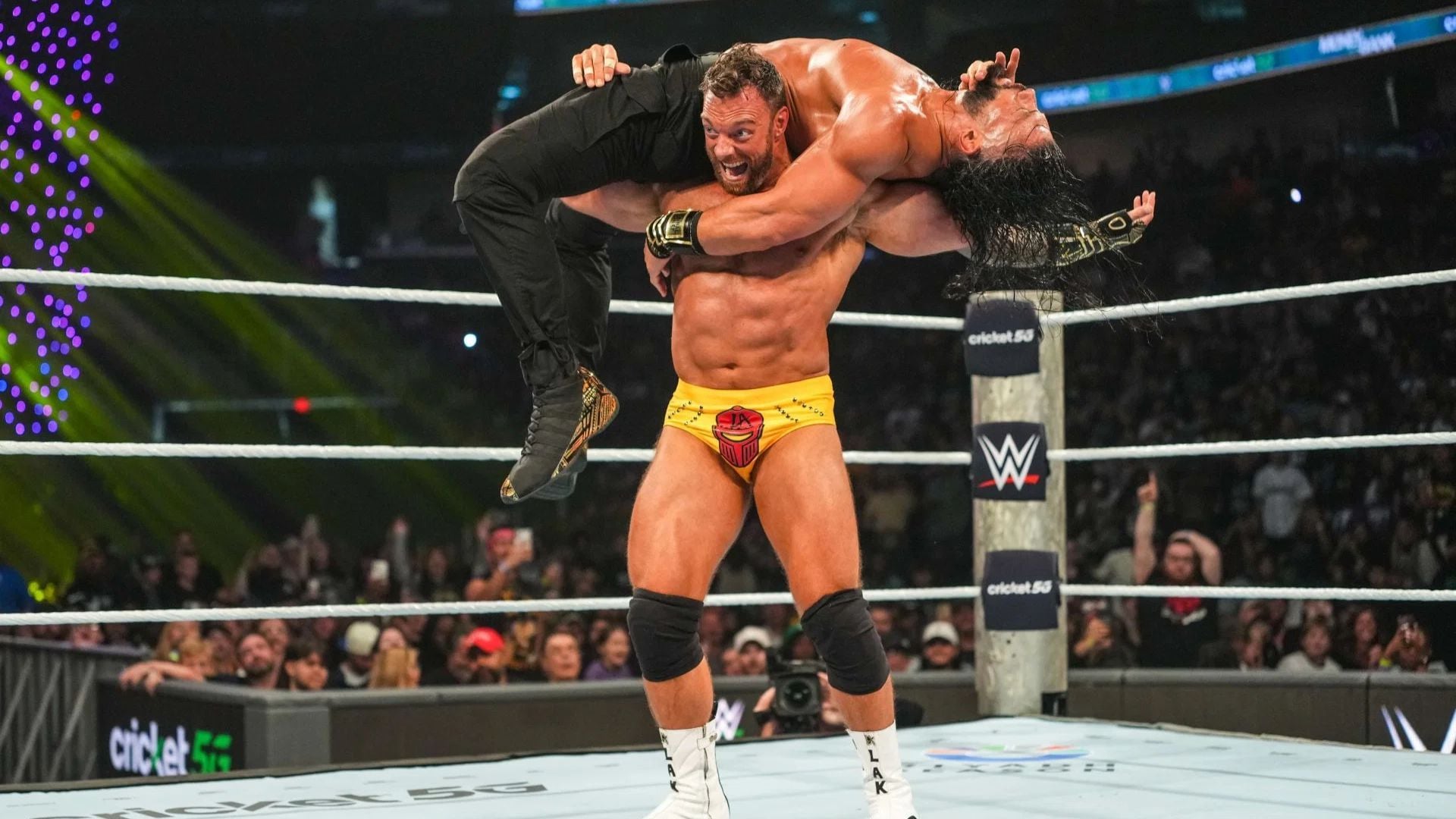 Awkward Botch At MITB: LA Knight Almost Injures Roman Reigns [VIDEO]